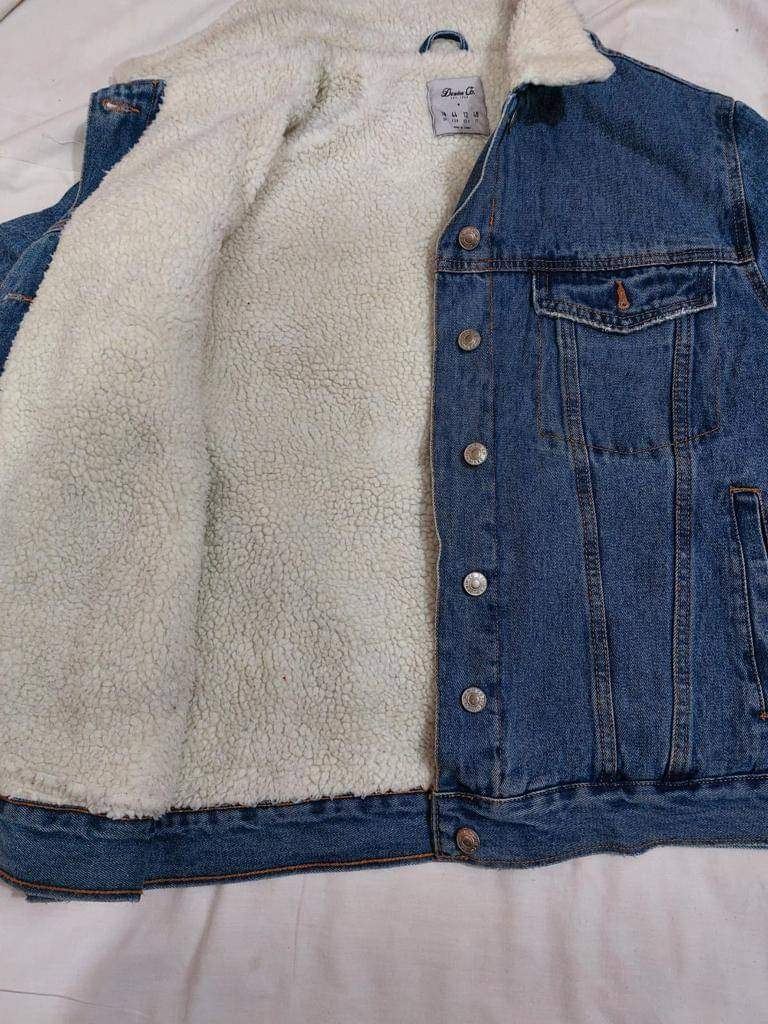 Sherpa-lined denim jacket, open to show fleece lining