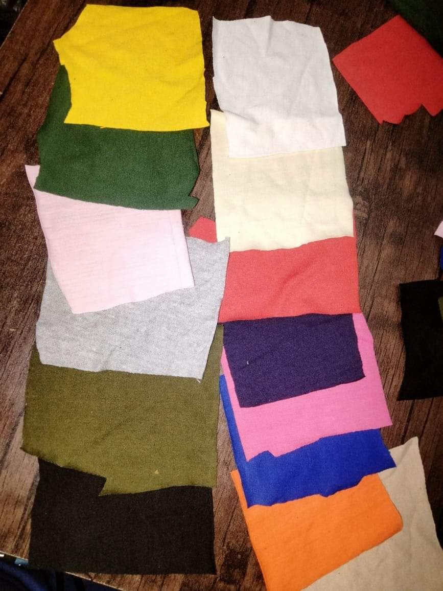 Stack of multicolor fabric swatches