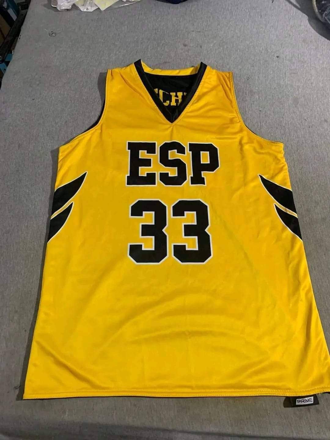 Yellow and black custom basketball jersey, number 33